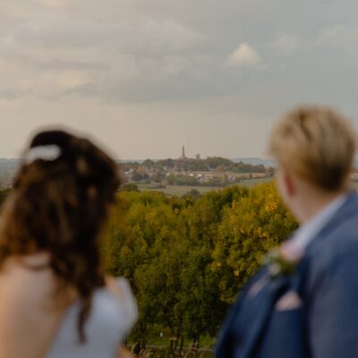 Two brides looking at lilleshal pillar from The Shropshire Wedding Venue